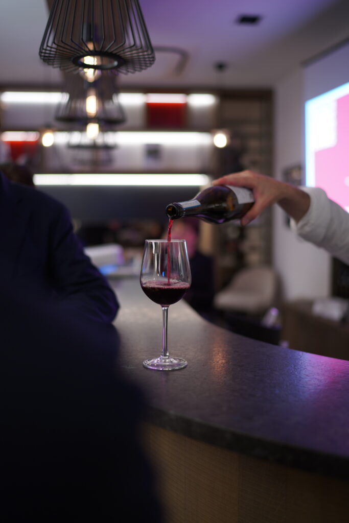 Red wine being poured in a glass